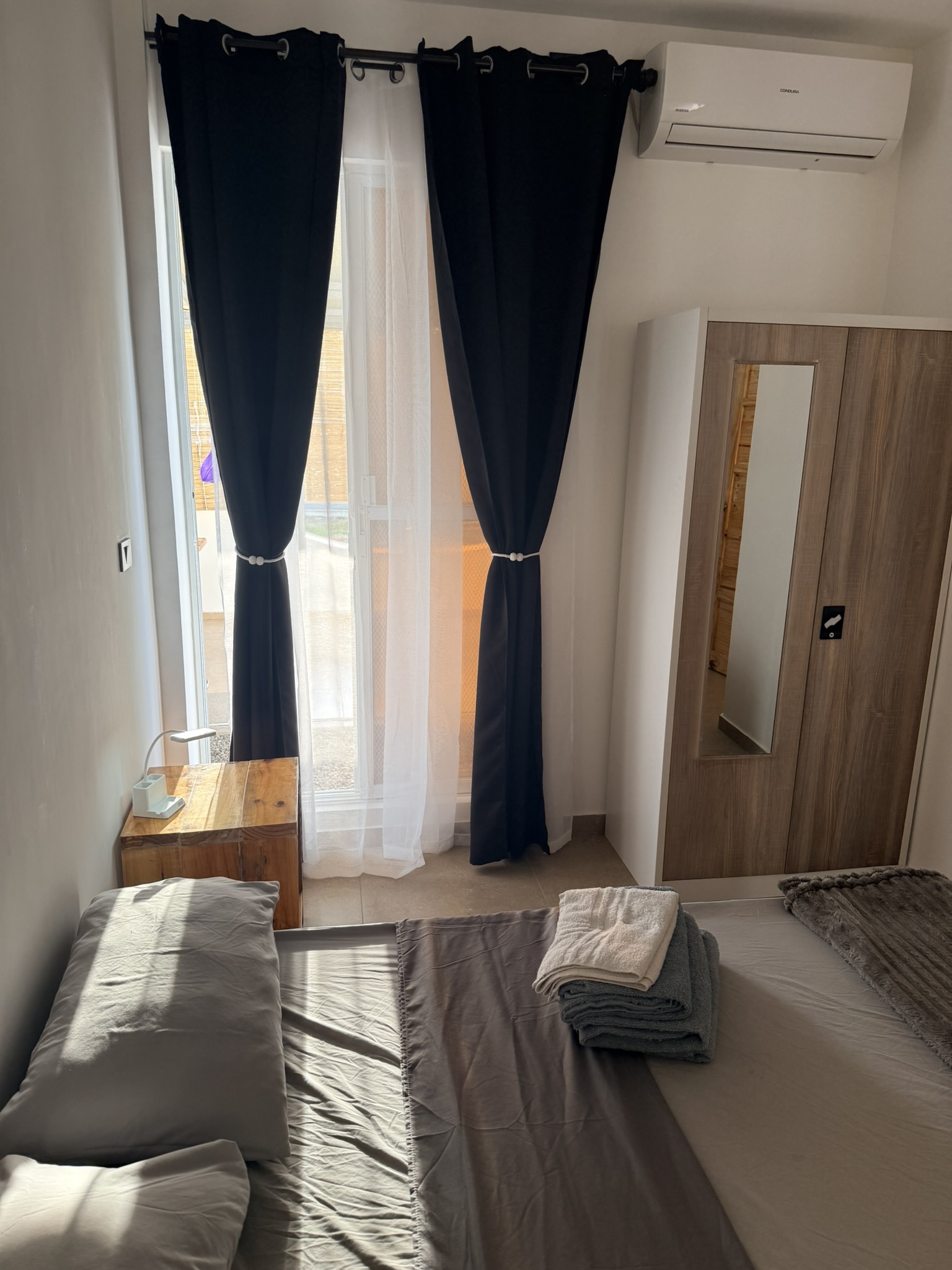 bedroom, where you will stay. It consists of a double bed, wardrobe and bedside table.