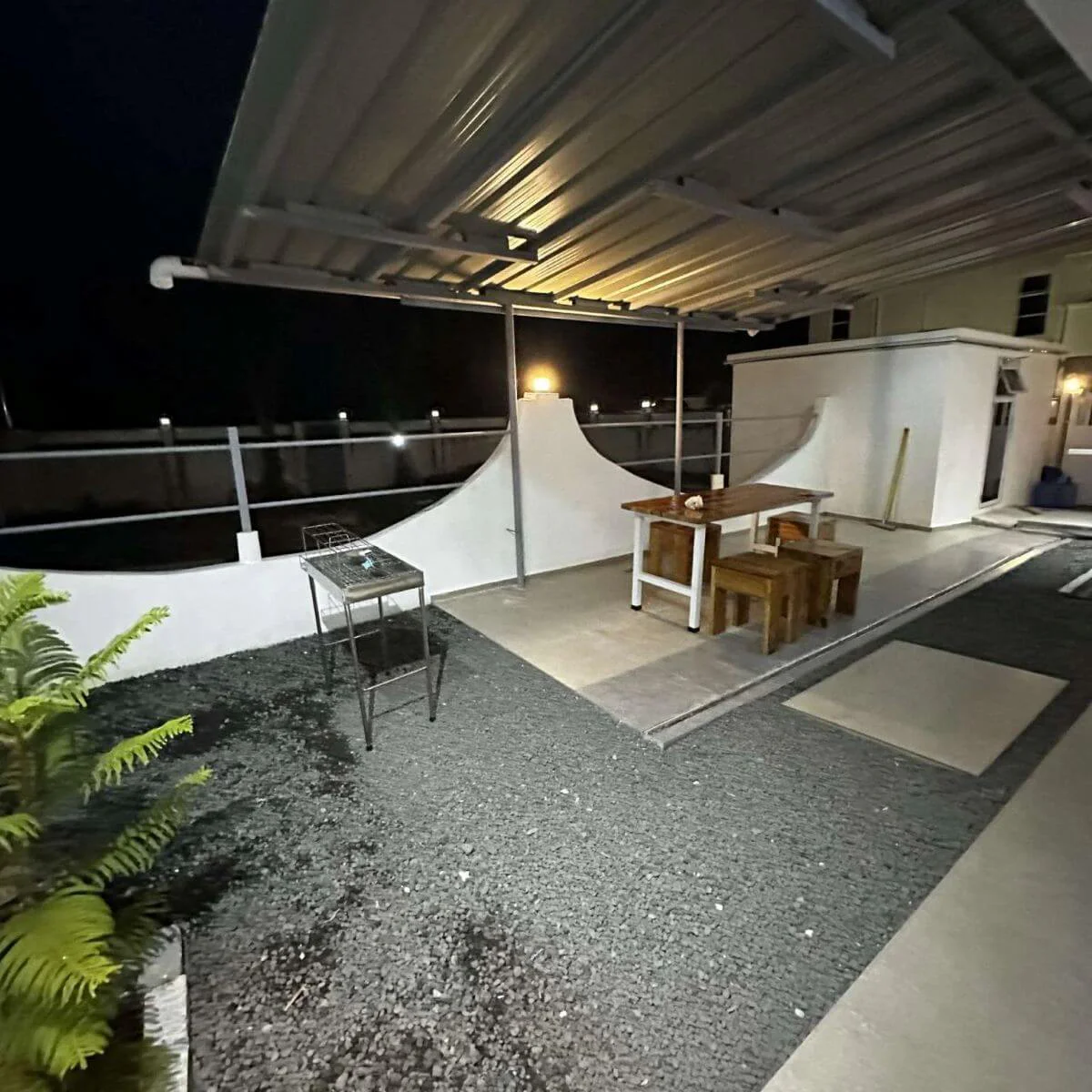 Hero house Bantayan patio entrance Papaya apartment in the night with lights